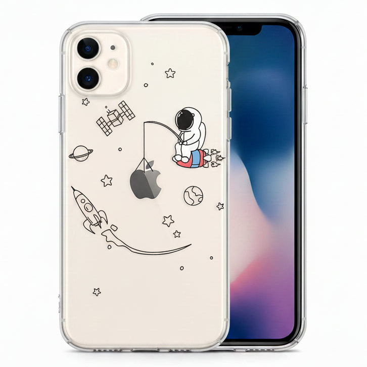 Phone case with cartoon astronaut design. Sitting on top of a rocket ship using what appears to be a fishing pool to move a planet that looks like a apple sign. There's another rocket ship a satellite planets and stars.